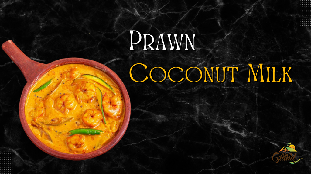 A close-up of a bowl of prawn curry with coconut milk on a black background. The prawns are cooked in a creamy coconut milk sauce with spices, and the dish is garnished with cilantro. The image is used to promote a recipe blog and to highlight the deliciousness of this prawn curry recipe.