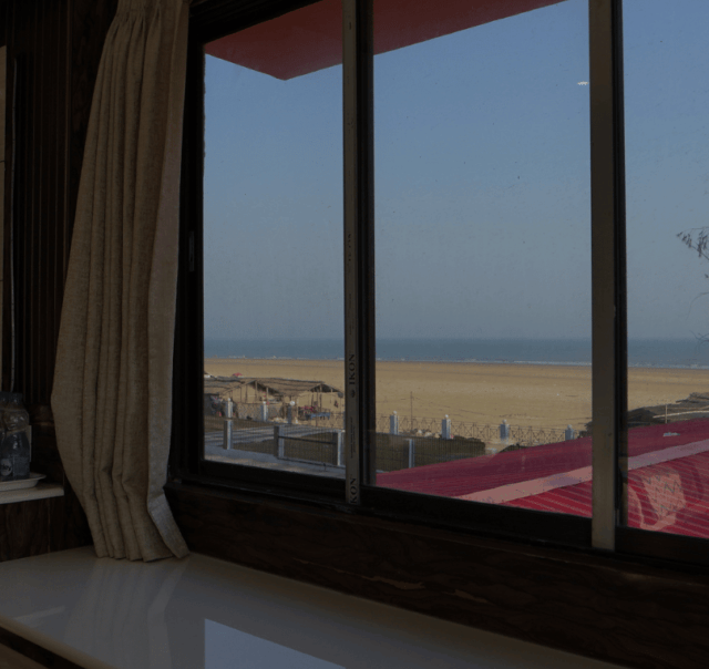 Comfortable resort room at Mohana Beach Resort, Mandarmani, West Bengal, India.